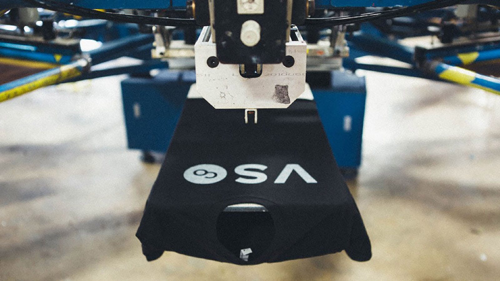 shirt being screen printed shirt being screen printed